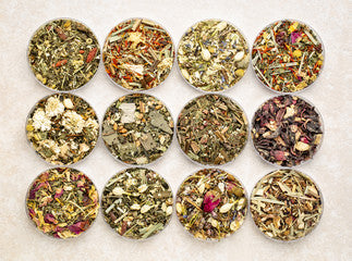 Herbal blend tea collection with aromatic dry tea in bowls