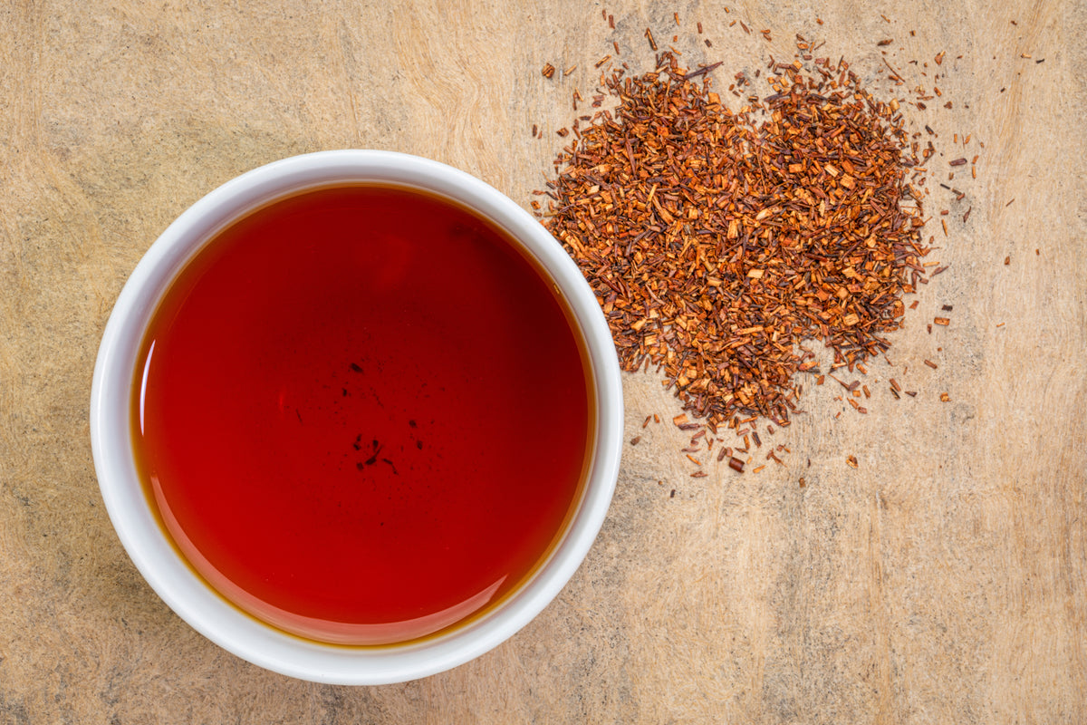 Rooibos red tea in a cup, rich earthy color