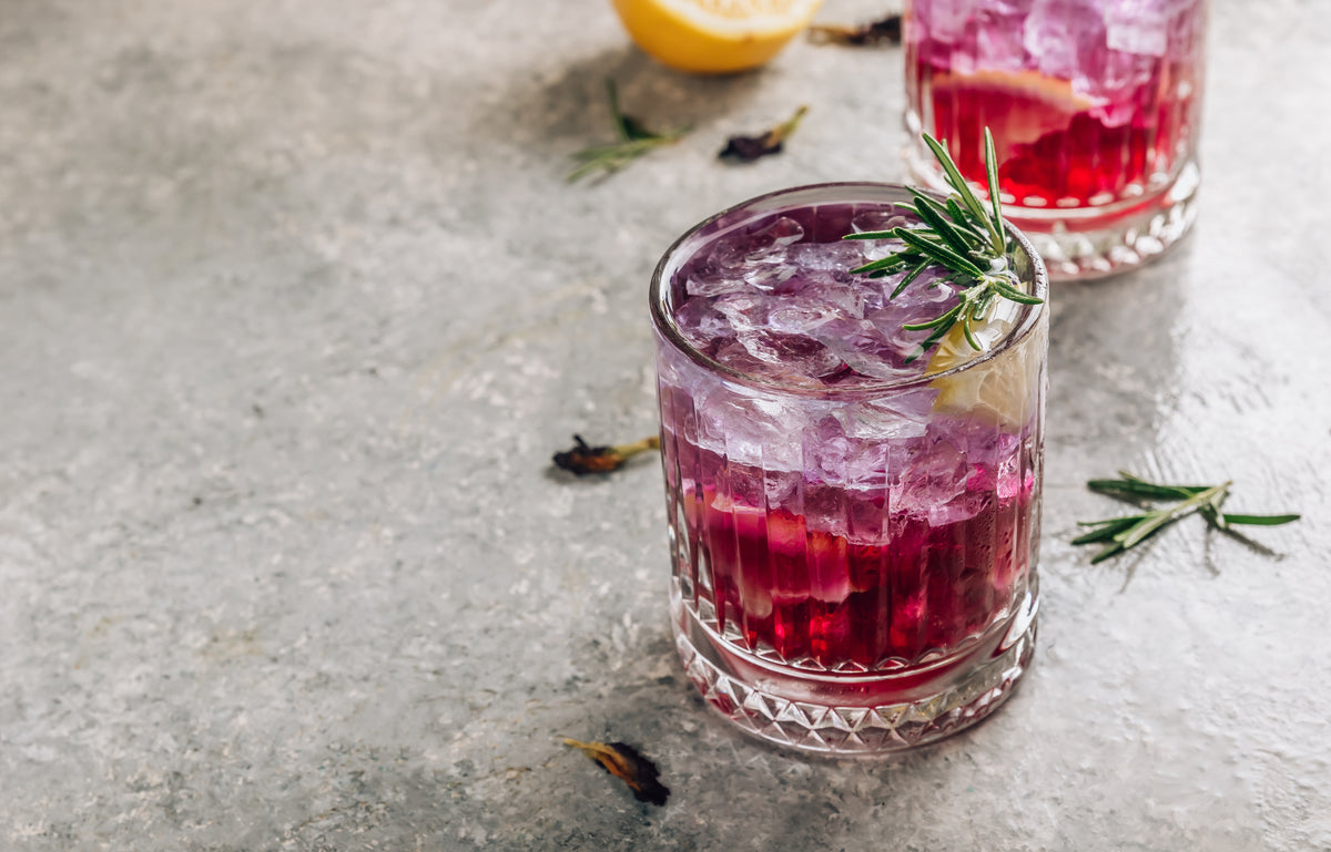 Butterfly pea flower tea with lemon slice, purple floral drink